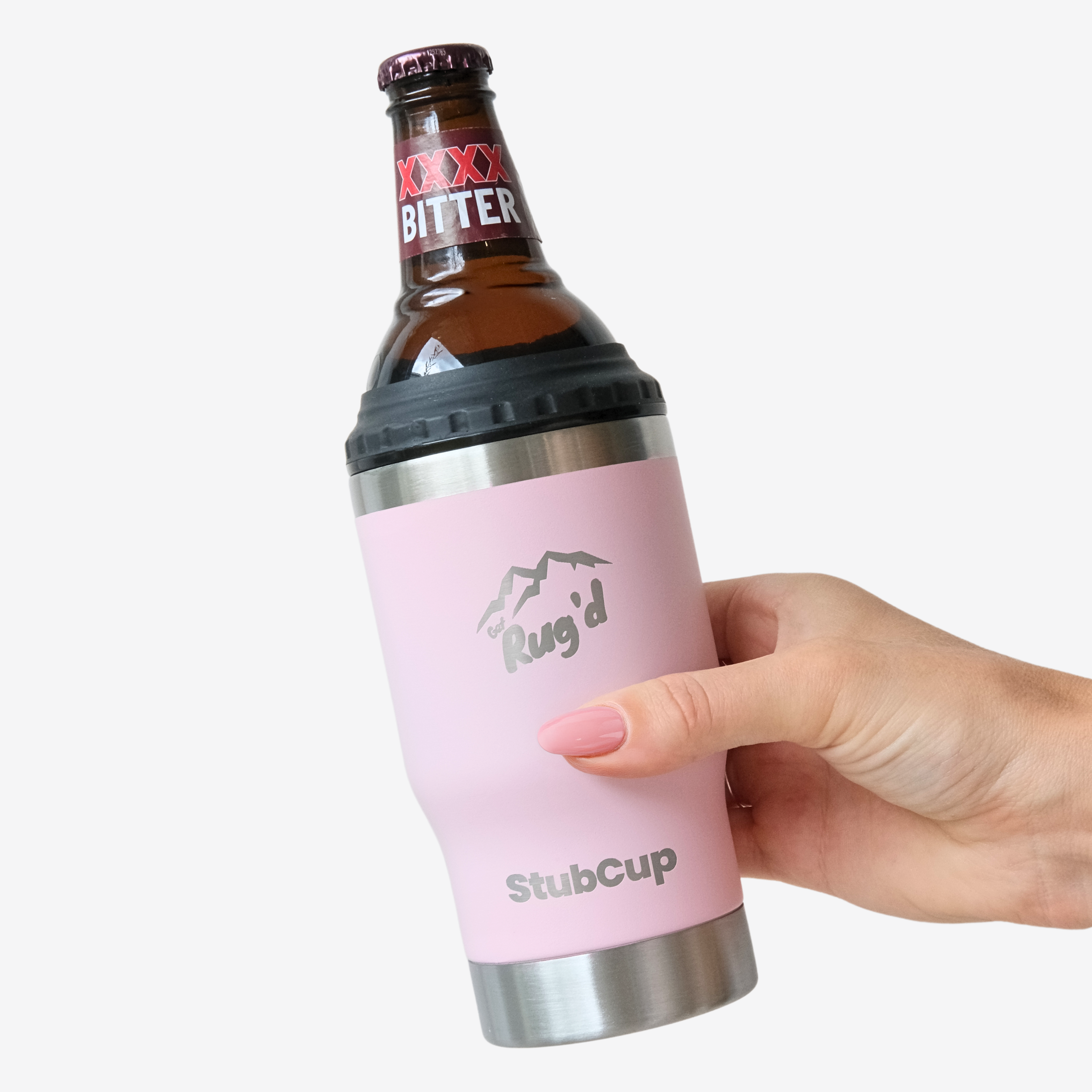 StubCup Pink can cooler drinking cup by Get Rug'd holding a brown glass beer bottle