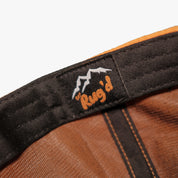 Get Rug'd brown outdoor cap featuring a stylish logo for outdoor adventures