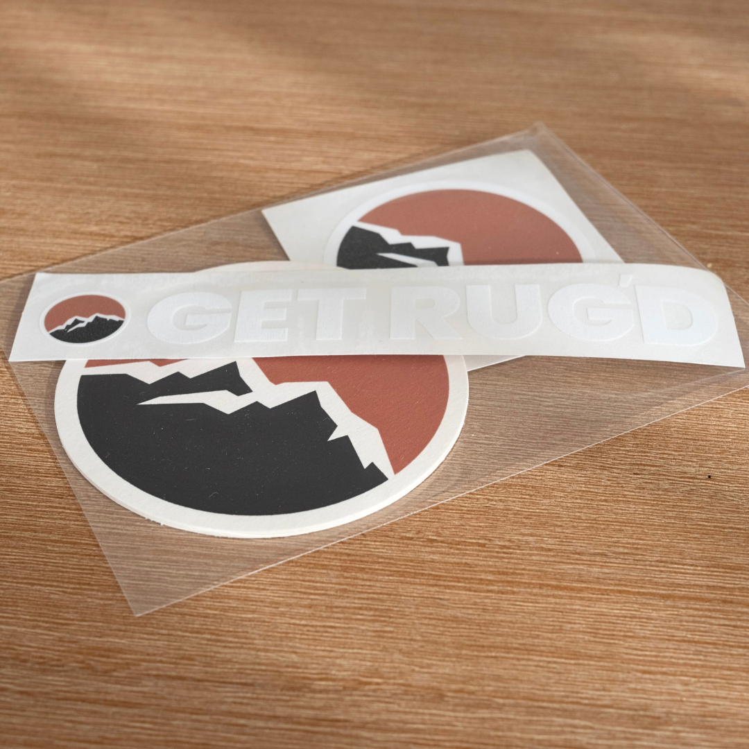 Get Rug'd car decal sticker coaster pack with a purple StubCup holding a bottle