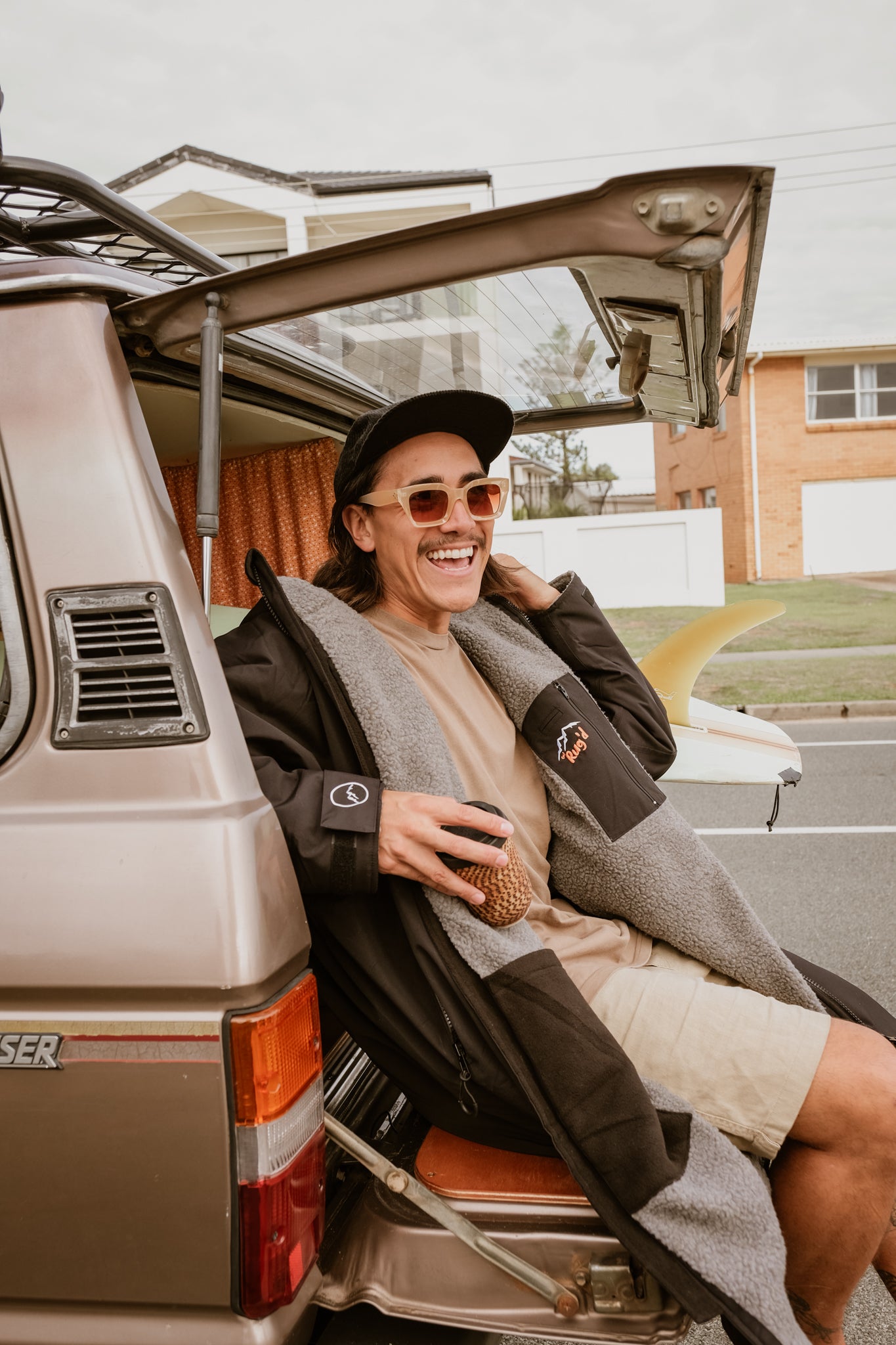 get rugd hydrocloak jacket changing robe camping explore adventure vanlife surfing about us