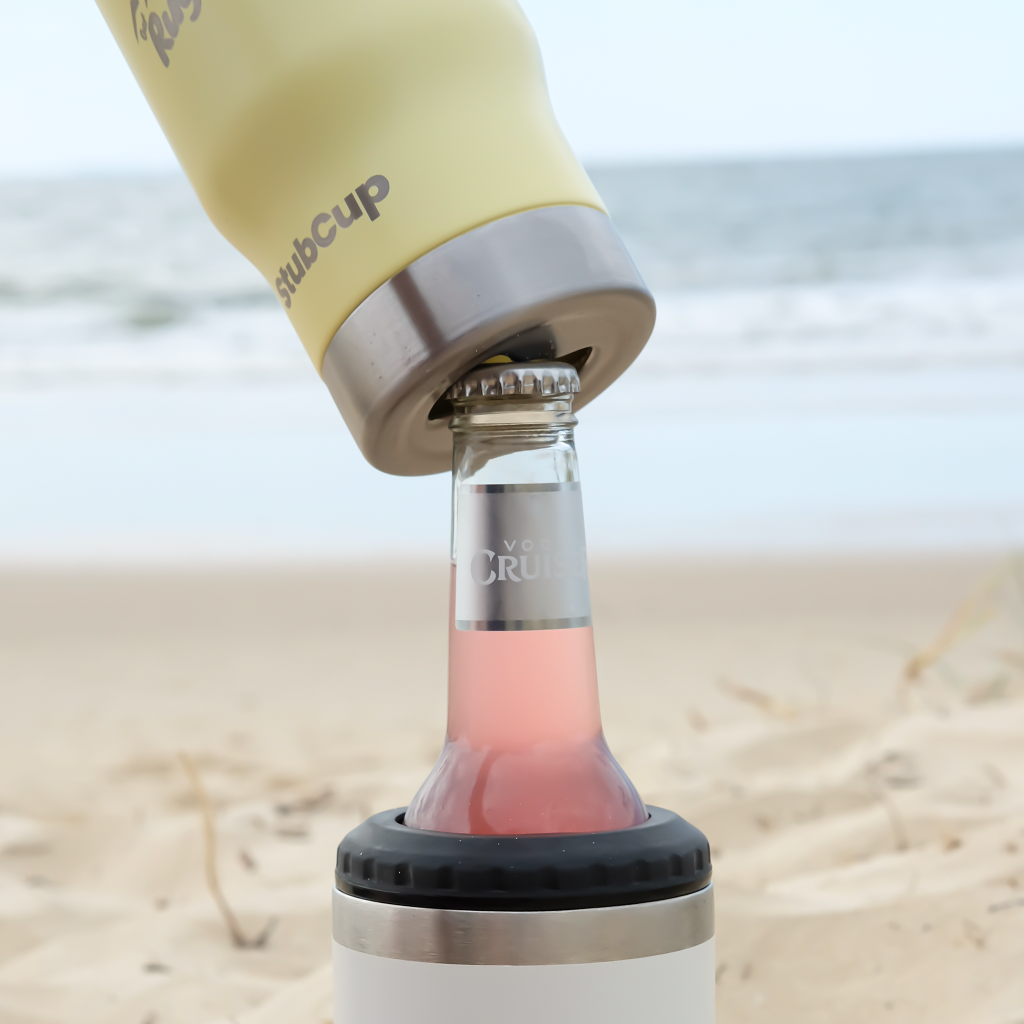 Get Rug'd StubCup Limoncello can cooler drinking beer cup coffee on the beach with a bottle in use