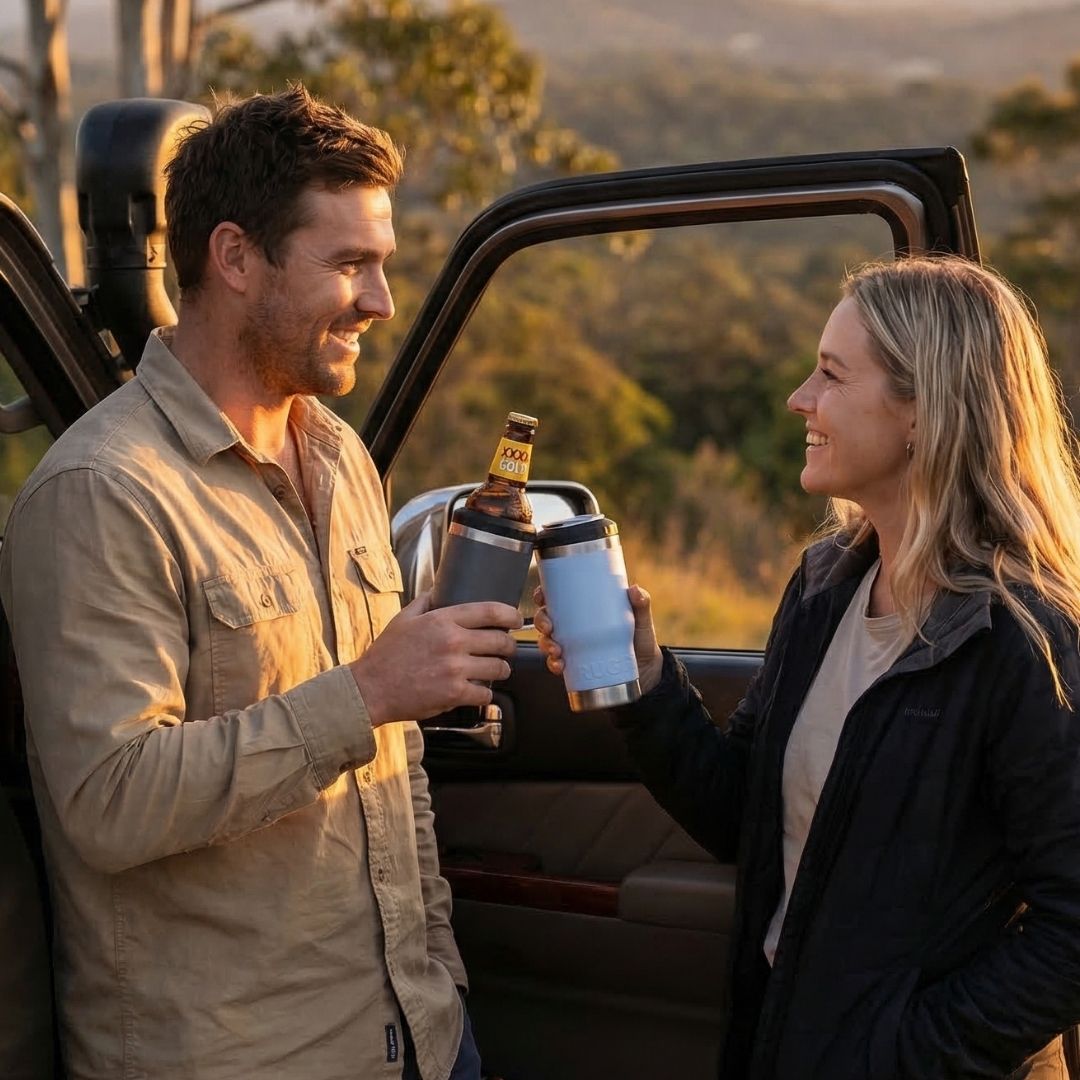 Couple enjoying cold drinks outdoors with the RUGD StubCup insulated stubby cooler and coffee cup on a Australian road trip