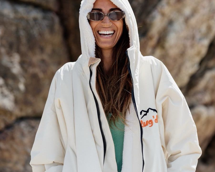 A woman wearing an outdoor jacket robe HydroCloak waterproof and windproof