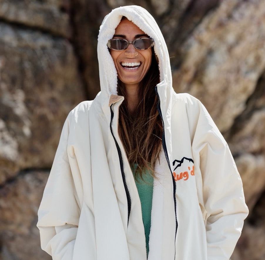 A woman wearing an outdoor jacket robe HydroCloak waterproof and windproof
