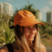 Get Rug'd Dad Cap Brown worn by girl outdoors 