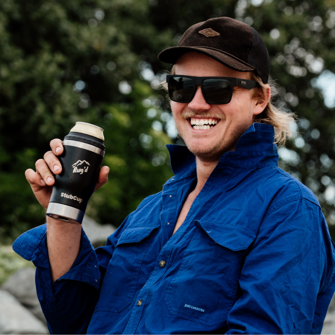 Get Rug'd StubCup stubby cooler coffee cup drinking beer with a happy man outdoors