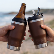 Two RUGD stubby cooler holder coffee cup mug 5in1 stubcup in hands at the beach