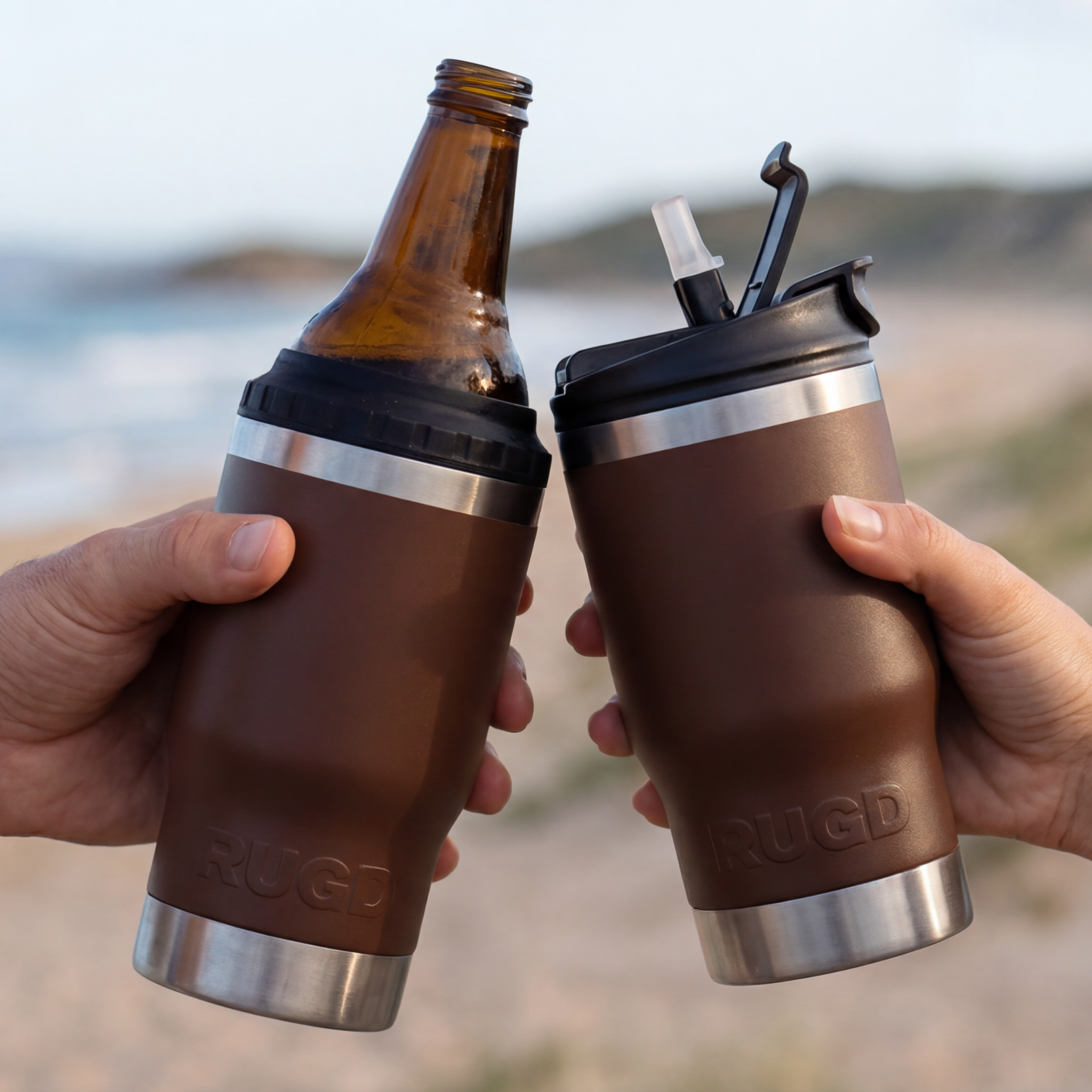Two RUGD stubby cooler holder coffee cup mug 5in1 stubcup in hands at the beach