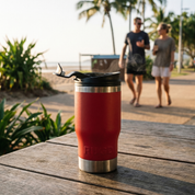 Get Rug'd StubCup Red stubby cooler coffee cup can cooler drinking on a table by the beach