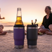 Get Rug'd StubCup Purple tumbler purple beer drinking cup next to a bottle at sunset