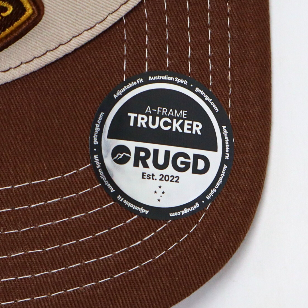 Get Rug'd Australian outdoor trucker cap featuring a durable design and adjustable fit