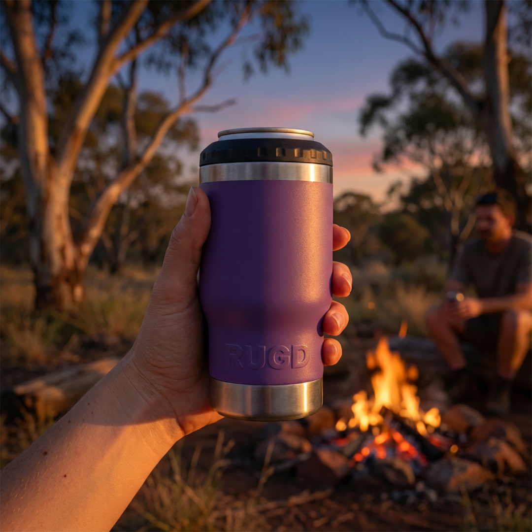 StubCup Purple tumbler purple beer drinking cup held outdoors by a campfire