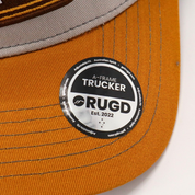 Get Rug'd A-Frame Trucker Cap in Brown and Yellow with Stylish Logo Patch