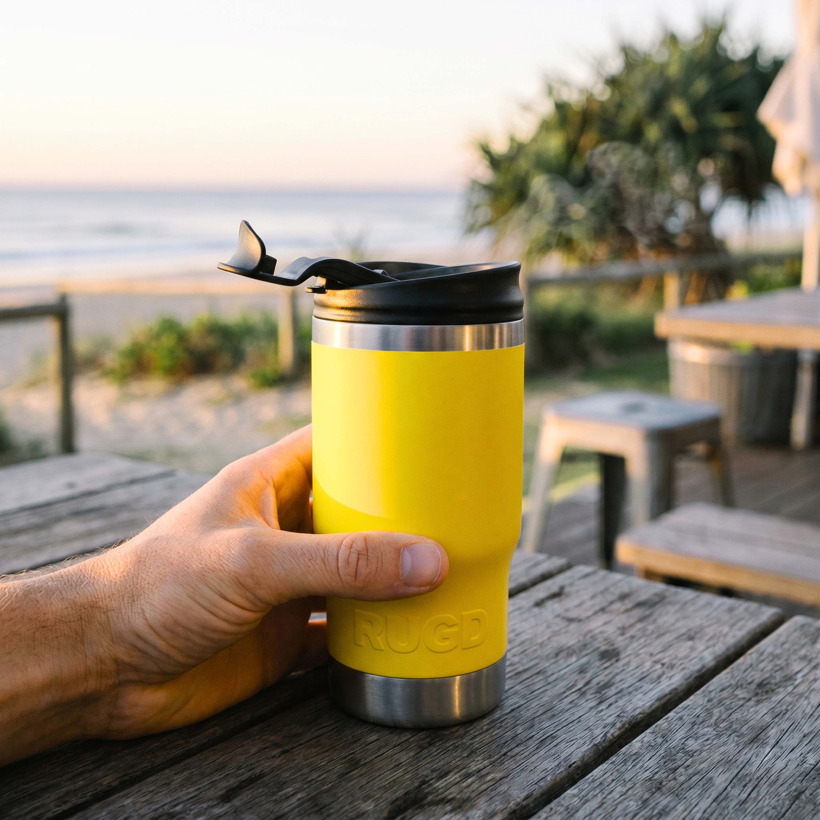Yellow Travel Cup with Stainless Steel Base, Ideal for Outdoor Use from RUGD