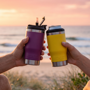 Colorful Insulated Cups for Beach Use with Straws in Purple and Yellow