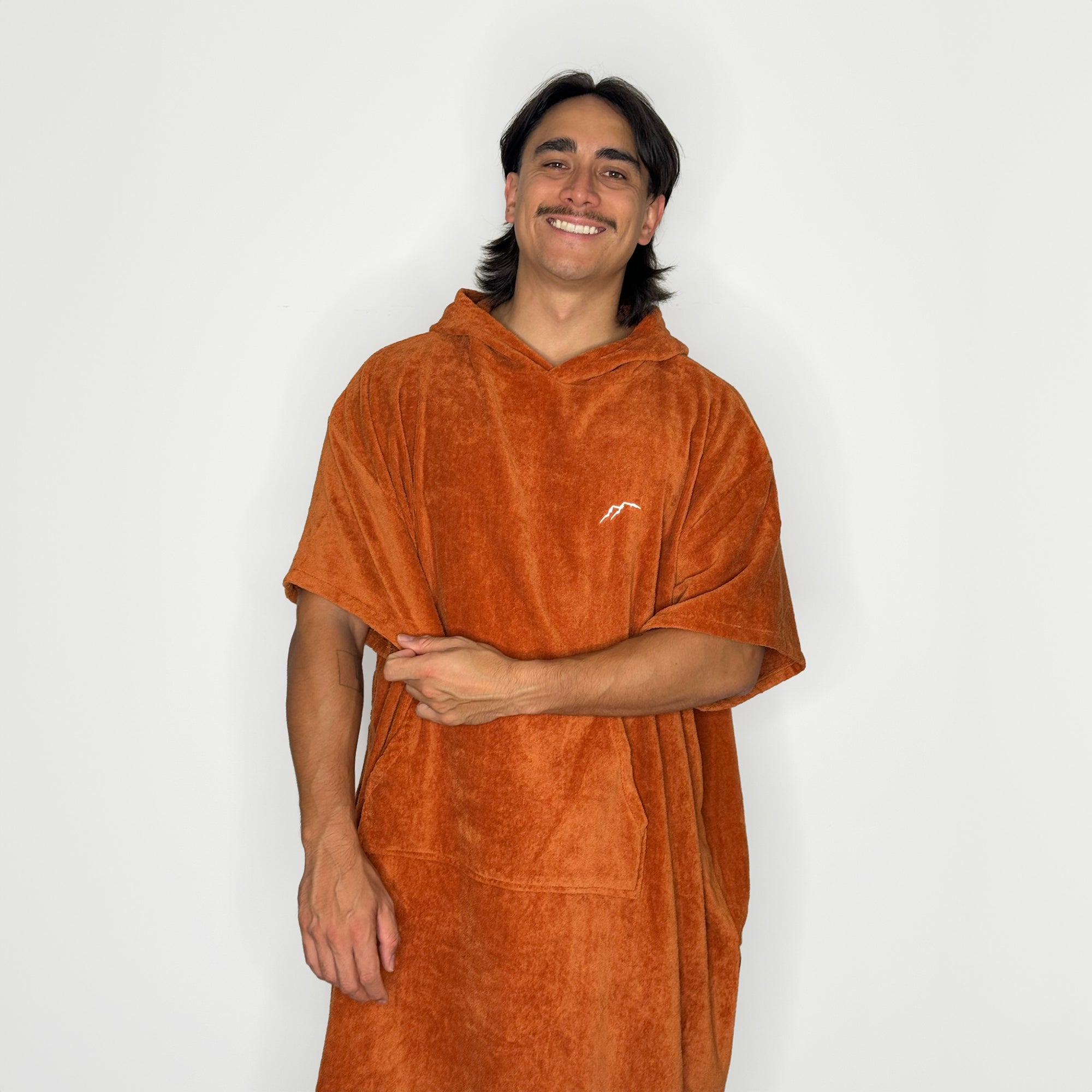 Get Rug'd Towel Poncho in Rust Color for Comfortable Post-Swim Drying and Relaxation
