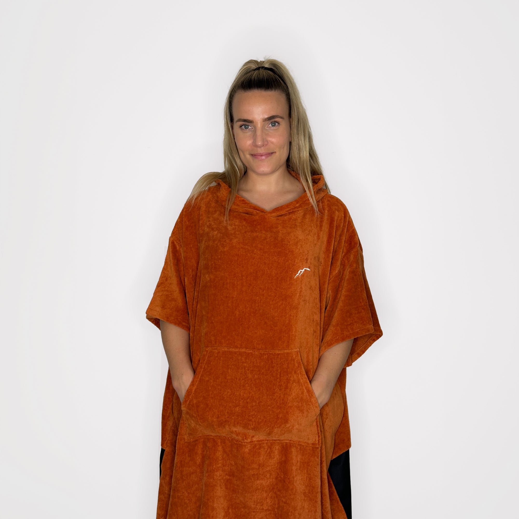 Get Rug'd Towel Poncho in Orange with Side Pockets for Comfortable Beach Changing