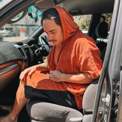 Get Rug'd Towel Poncho in Rust Color for Comfortable Wear After Swimming or Surfing