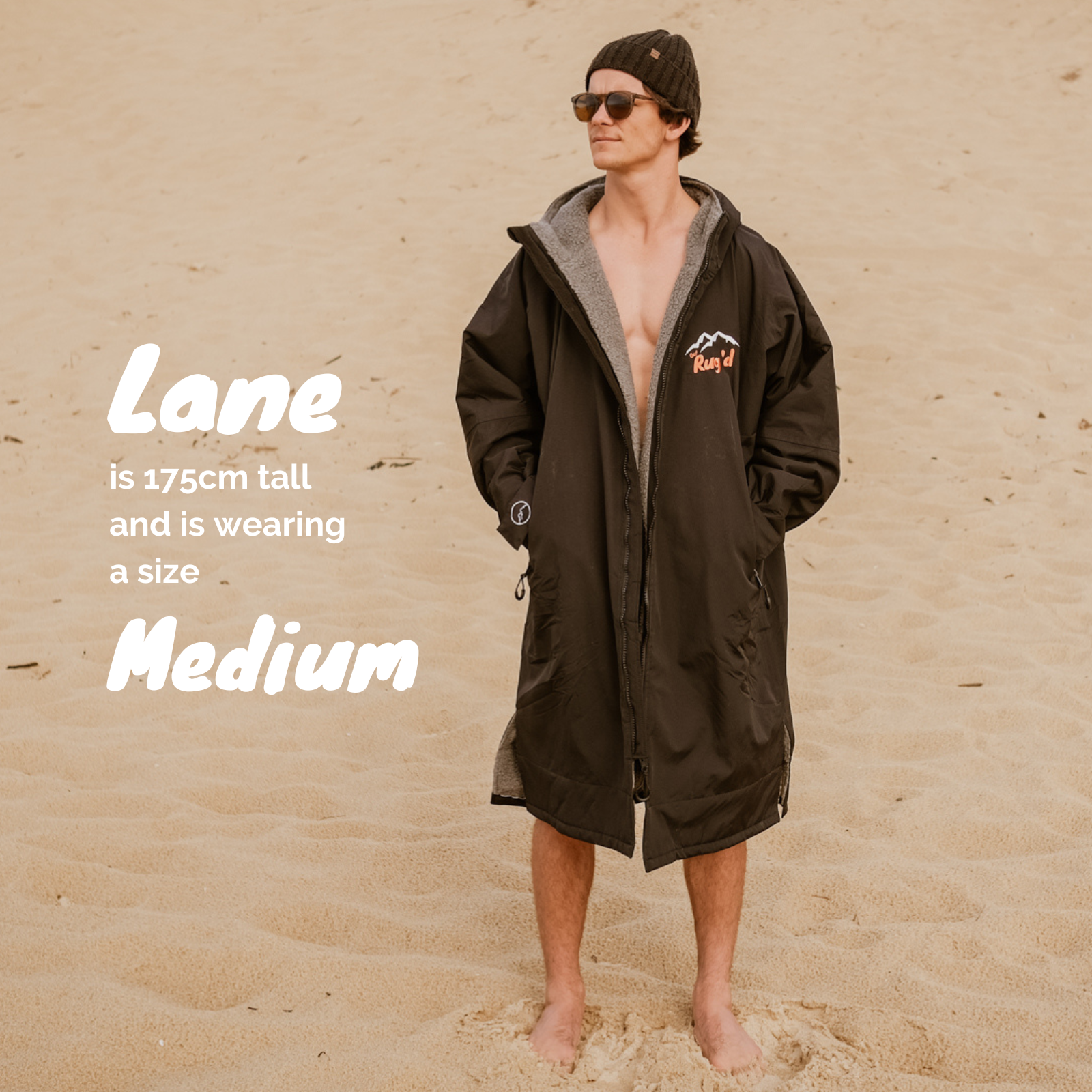 Get Rug'd Robe in Black with Grey Lining and Hood, designed for comfort after water sports, features hydrocloak waterproof cream